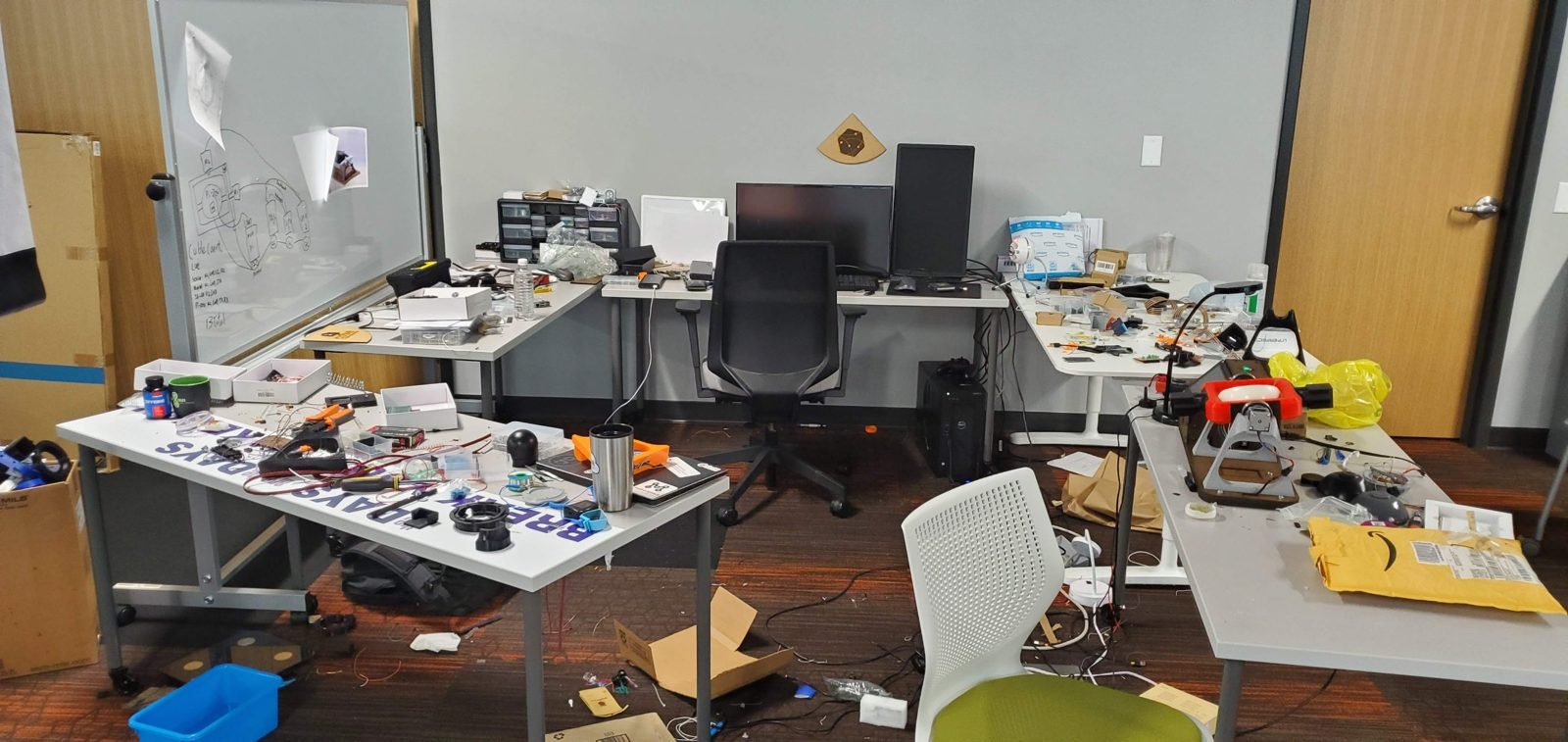 The COSE workspace at StartingBlock, with workbenches, time-lapse imagers, clinostat frames and parts